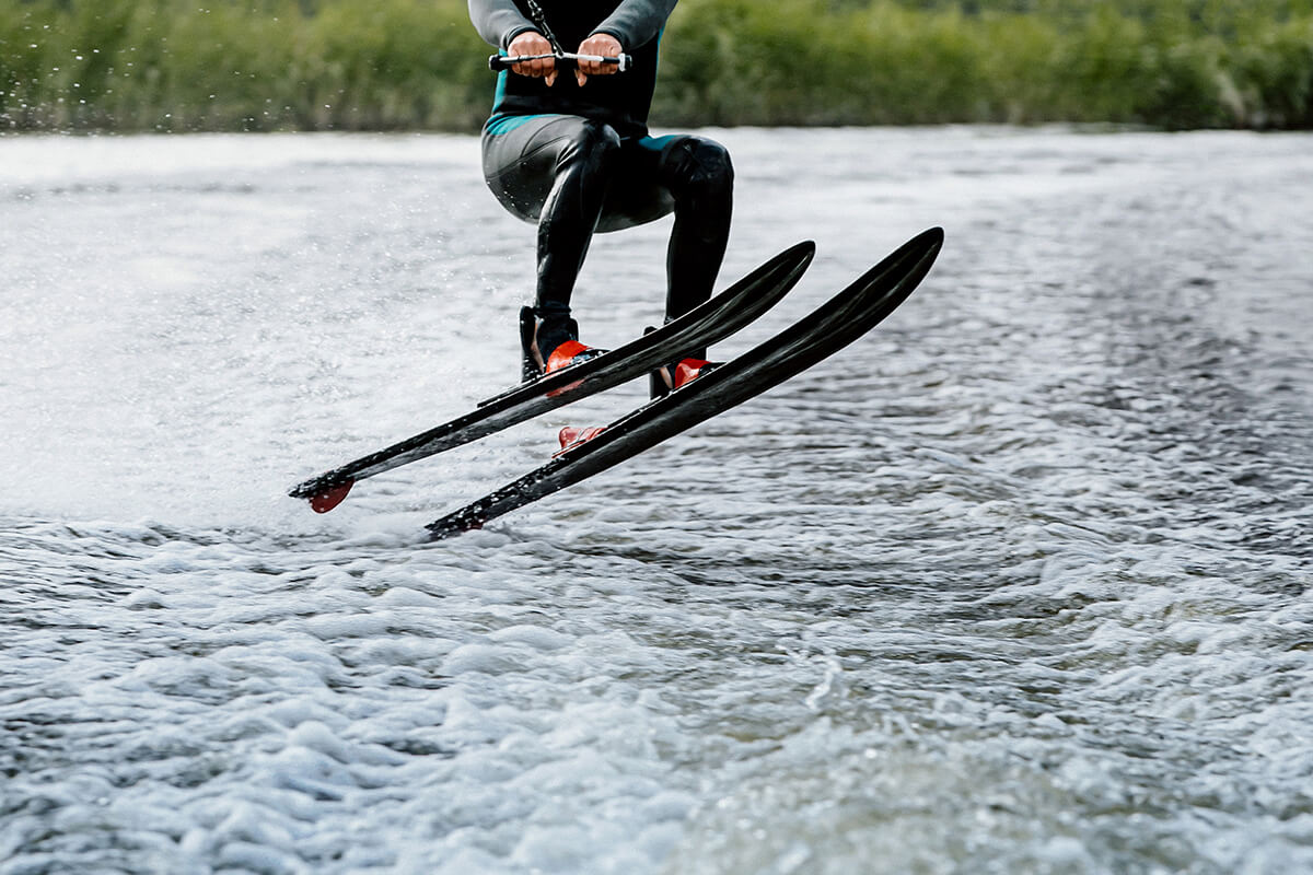 You are currently viewing Man waterskiing on lake behind